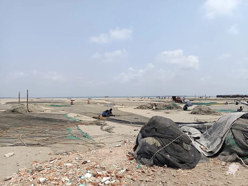 The wide sand beach at Cox's Bazar fishing net