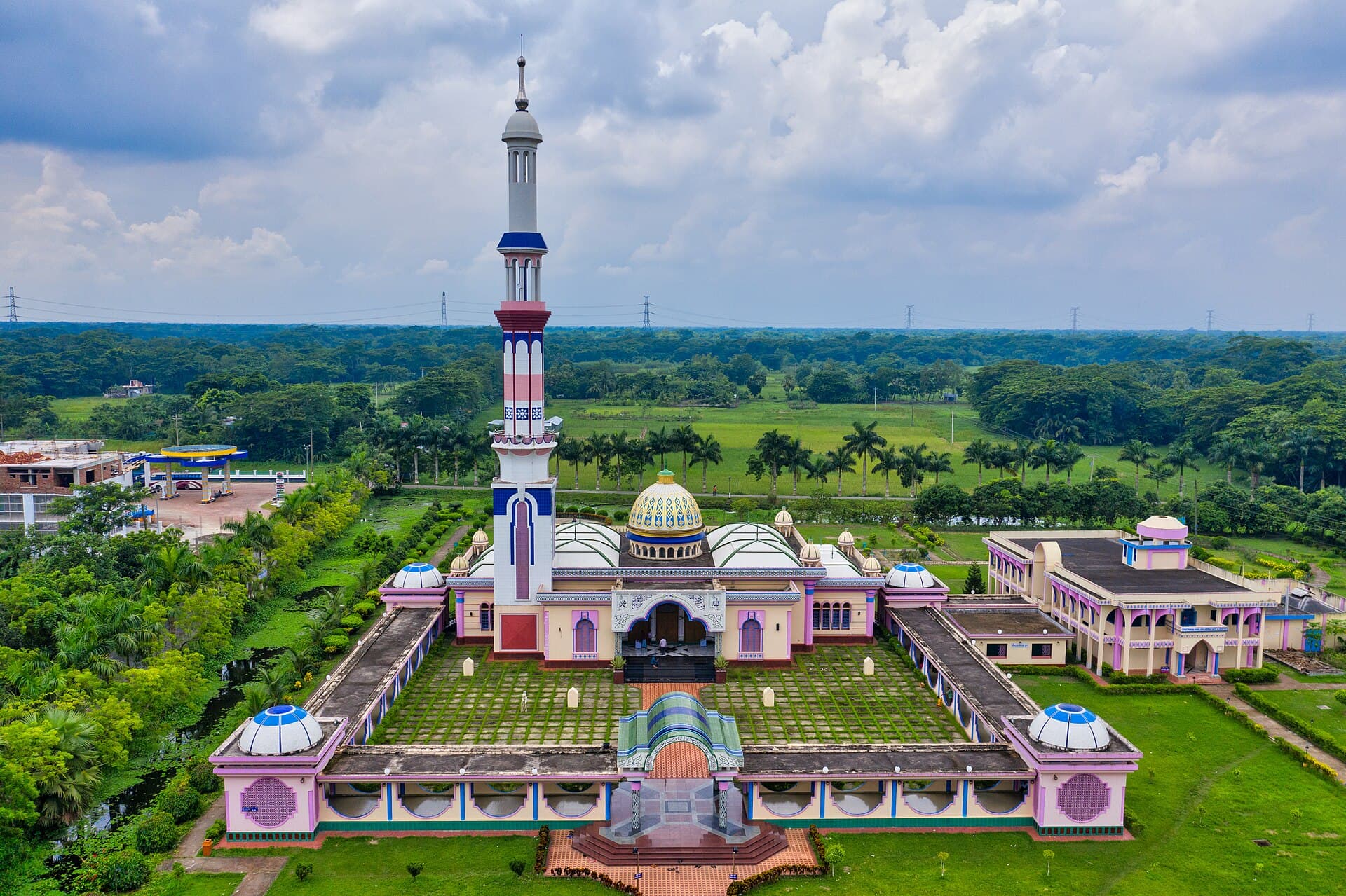 White domes and minarets of Baitul Aman Jame Mosque at Guthia, Barisal
