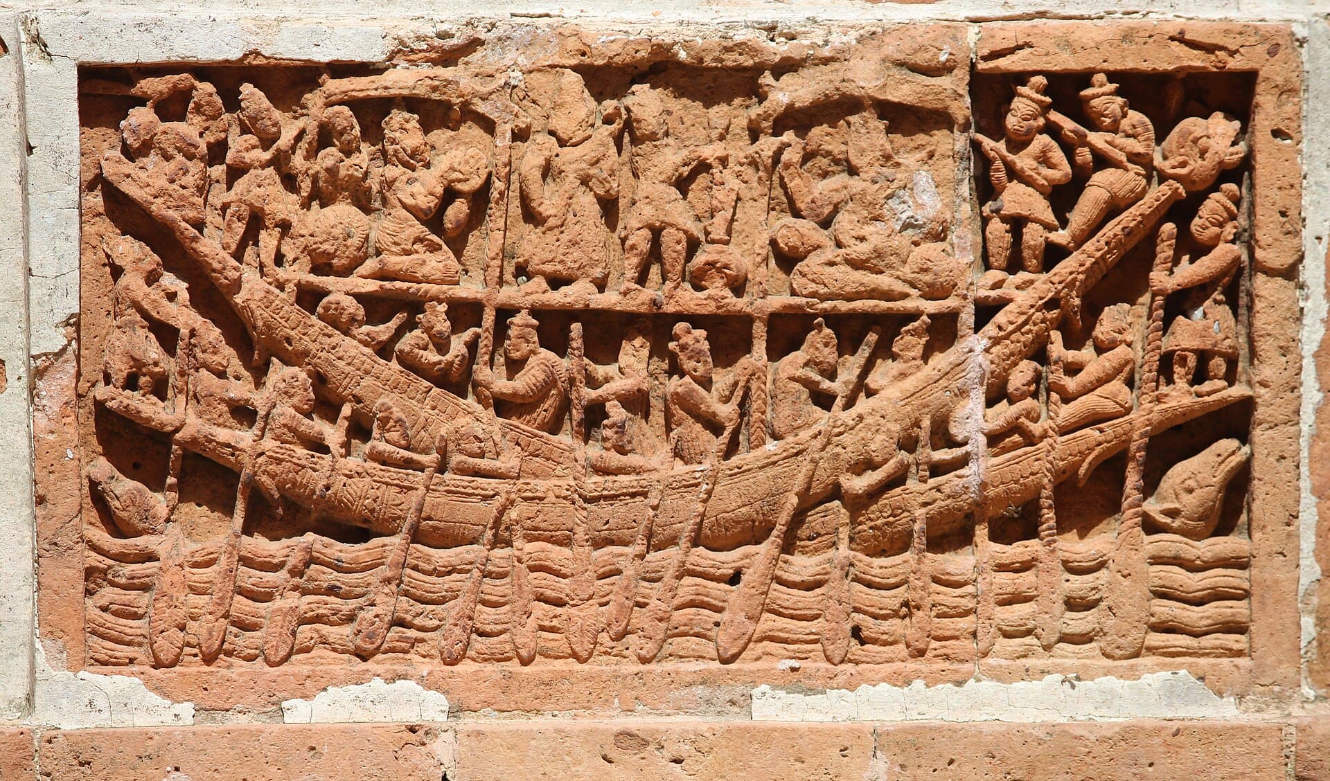 Detailed terracotta figures carved on the wall of Kantajew Temple